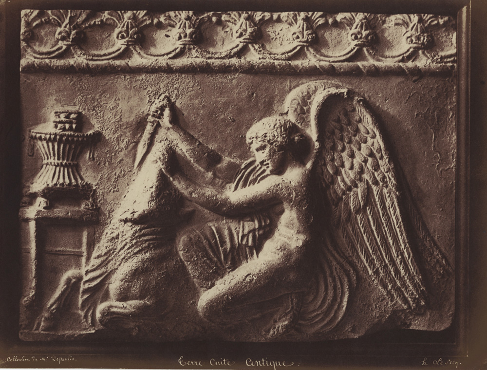 Antique Terracotta Relief of an Angel Slaying a Bull