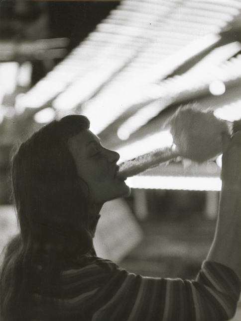 Robert Doisneau - Christiane Chevalier Eating Cotton Candy at Ivresse, Foire du Trone