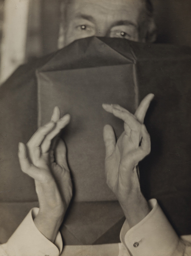 Portrait of a Half-Hidden Man With Expressive Hands (Russell H. Greeley)