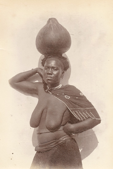 Anonymous - Partially Nude Bantu Woman Balancing a Water Gourd on Her Head