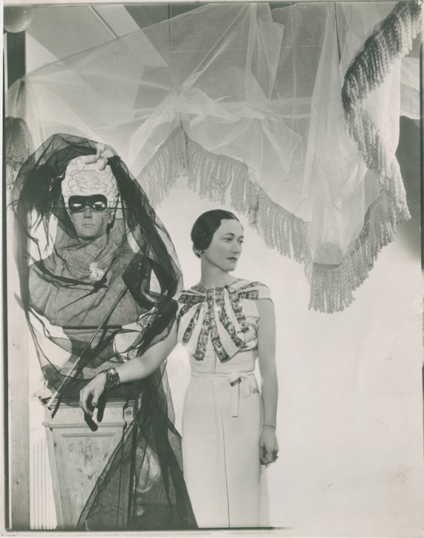 Cecil Beaton's iconic portrait of Wallis Simpson posed by a masked statue covered in black tulle, estimated at $3,000-5,000.