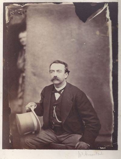 Baudelaire peeks out from behind the drop cloth.
